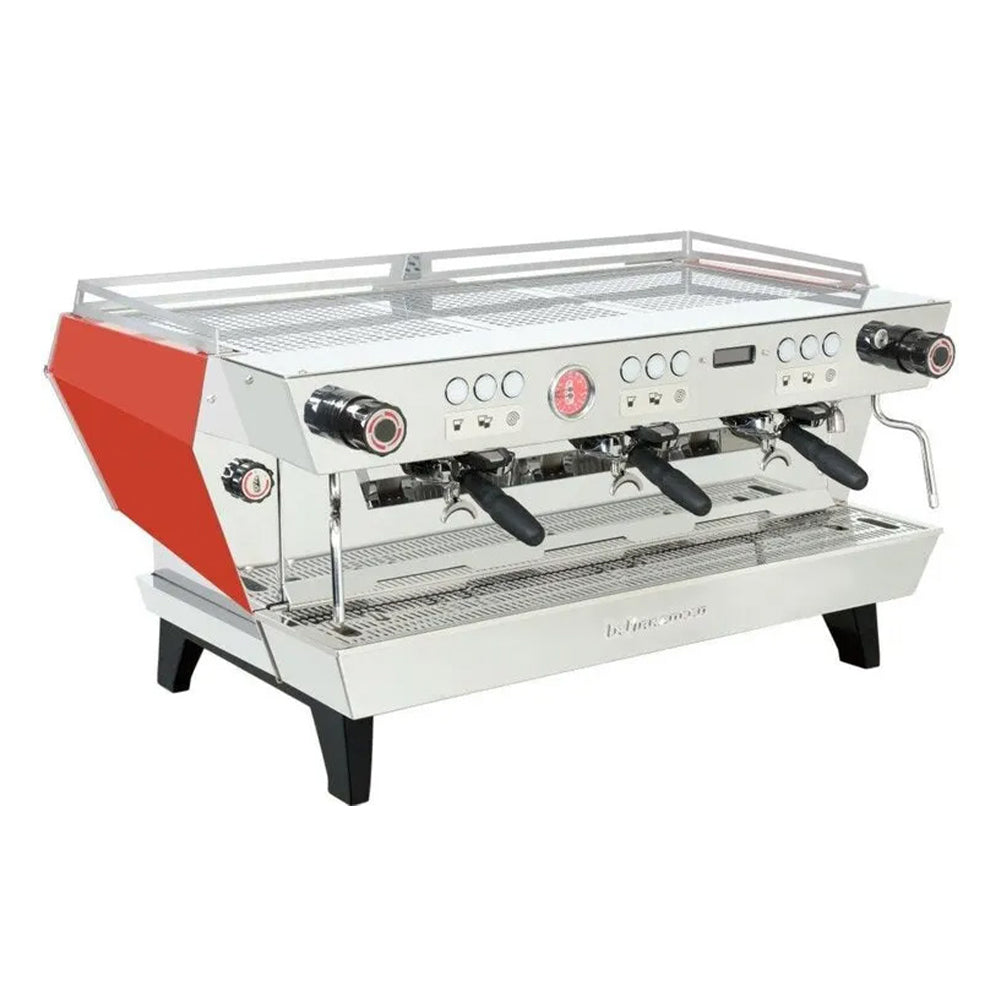 La Marzocco KB90 commercial espresso machine with three group heads and stainless steel body