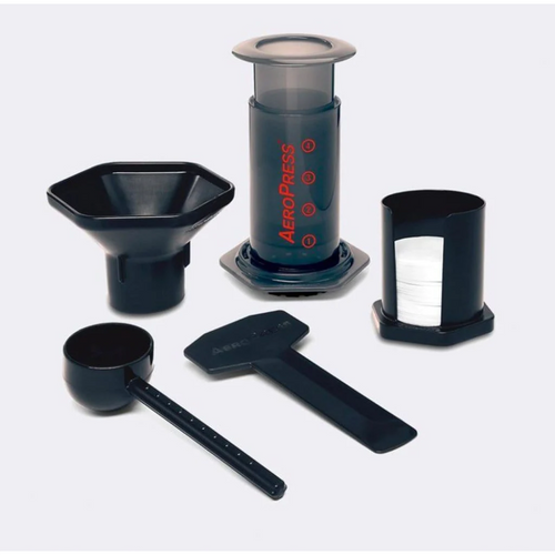 AeroPress coffee maker set with brewing chamber, funnel, scoop, stirrer, and filter holder in black