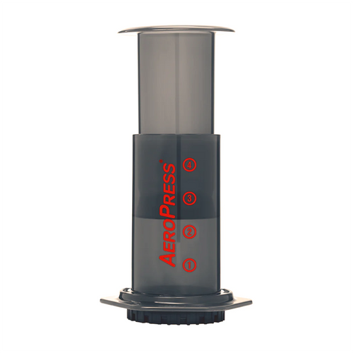 AeroPress coffee maker in black with red logo and measurement markings for brewing coffee