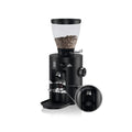 Black Mahlkoenig X54 coffee grinder machine with transparent bean hopper filled with coffee beans
