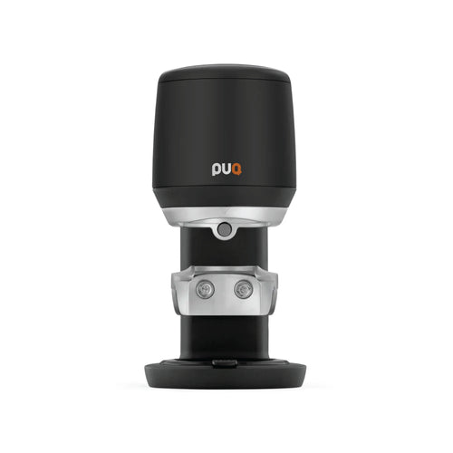 PUQ Press MINI GEN 6 automatic tamper with sleek black and silver design for professional espresso preparation