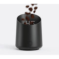 Subminimal Subscale black digital coffee scale with LED display and falling coffee beans