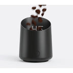 Subminimal Subscale black digital coffee scale with LED display and falling coffee beans